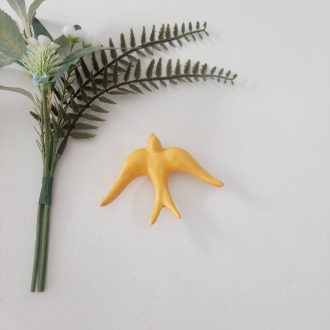 andorinha amarela vidrada pequena