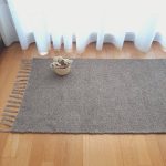 Small taupe rug