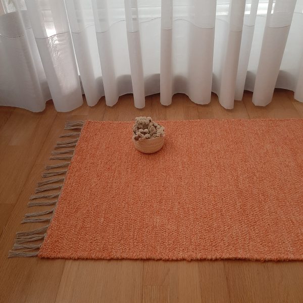 small salmon rug