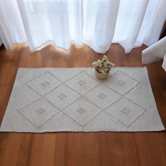 small beige rug geometric