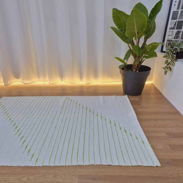 handmade white and green rug