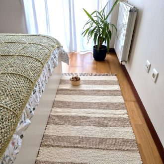 cream and light brown striped rug