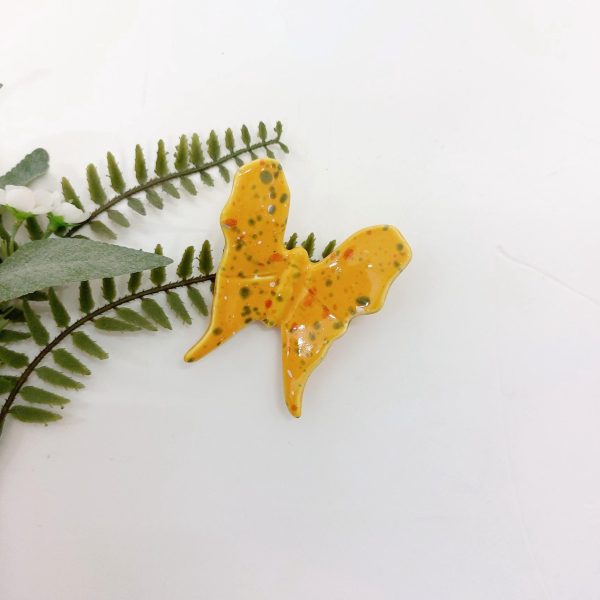 yellow ceramic butterfly