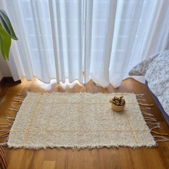 small cream and yellow rug