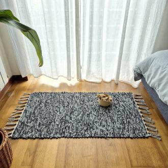 small black and grey rug