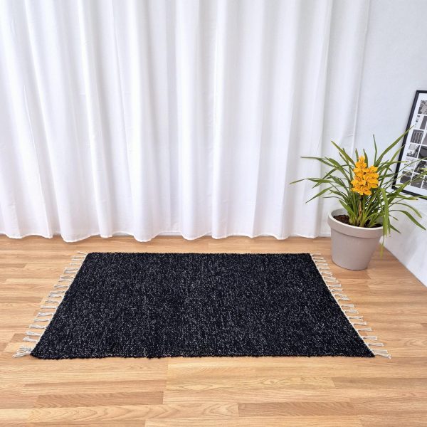 black handwoven rug made in recycled cotton